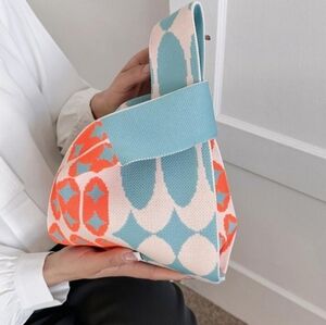 Knitted geometric hand bag